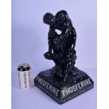 A RARE BLACK PAINTED ALLOY PHOSFERINE TONIC ADVERTISING FIGURE modelled as male ripping open a rock.