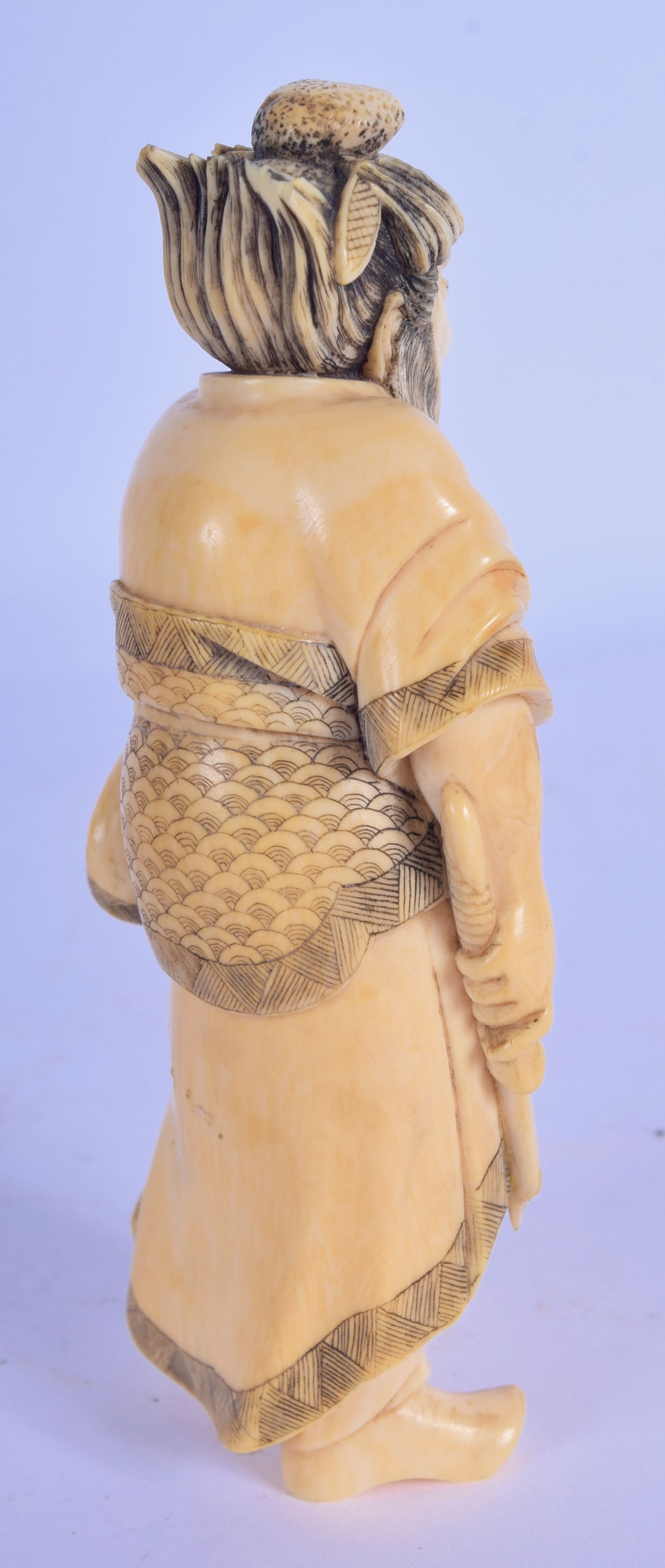 A 19TH CENTURY JAPANESE MEIJI PERIOD CARVED IVORY OKIMONO modelled as a warrior. 10 cm high. - Image 3 of 4
