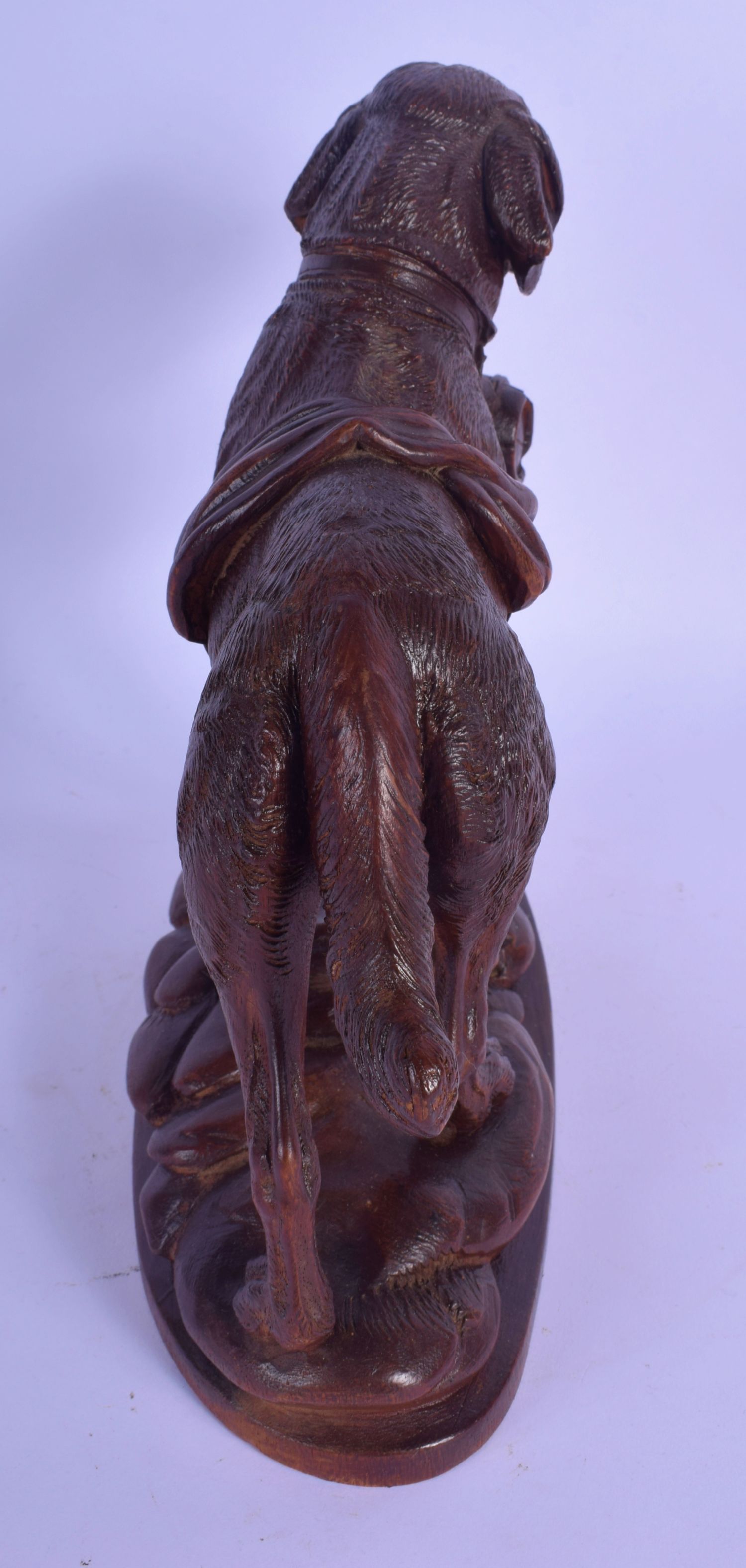 A 19TH CENTURY BAVARIAN BLACK FOREST CARVED WOOD FIGURE OF A HOUND modelled roaming upon a naturalis - Image 3 of 4