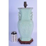 A 19TH CENTURY CHINESE TWIN HANDLED CELADON VASE Late Qing, converted to a lamp, decorated in relief