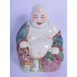 A CHINESE REPUBLICAN PERIOD FAMILLE ROSE PORCELAIN BUDDHA modelled seated holding prayer beads. 20 c