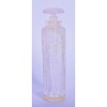 AN UNUSUAL FRENCH R LALIQUE SCENT BOTTLE AND STOPPER of slender proportions, decorated with trailing