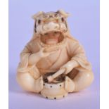A LOVELY 19TH CENTURY JAPANESE MEIJI PERIOD CARVED IVORY NETSUKE modelled as a seated boy wearing a