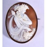 A FINE 19TH CENTURY EUROPEAN CARVED CAMEO SHELL BROOCH decorated with a female carrying a harvest 18