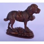 A 19TH CENTURY BAVARIAN BLACK FOREST CARVED WOOD FIGURE OF A HOUND modelled roaming upon a naturalis