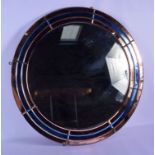 A CHARMING ART DECO PINK AND BLUE GLASS CIRCULAR MIRROR of stylised form. 70 cm diameter.