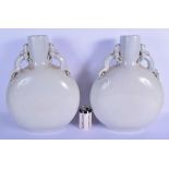 A LARGE PAIR OF EARLY 20TH CENTURY CHINESE BLANC DE CHINE PORCELAIN MOON FLASKS Late Qing/Republic,