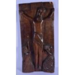 A LARGE 18TH CENTURY EUROPEAN CARVED WOOD RELIGIOUS PLAQUE depicting Christ with two attendants unde