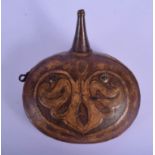 A RARE 18TH/19TH CENTURY ANIMAL HIDE MOUNTED STEEL POWDER FLASK decorated with a fleur de lys type m