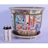 A 1950S CHINESE CANTON FAMILLE ROSE JARDINIERE ON STAND decorated with figures. 28 cm x 18 cm.