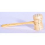 A VICTORIAN CARVED IVORY GAVEL. 14 cm long.