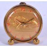 AN UNUSUAL VINTAGE BRASS WIND UP LION ALARM CLOCK with red numerals. 5.75 cm wide.