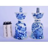 A PAIR OF 19TH CENTURY CHINESE BLUE AND WHITE PRICKET CANDLESTICKS Qing, painted with birds amongst