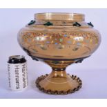 AN AESTHETIC MOVEMENT ENAMELLED GLASS PEDESTAL BOWL in the manner of Moser, decorated in relief with