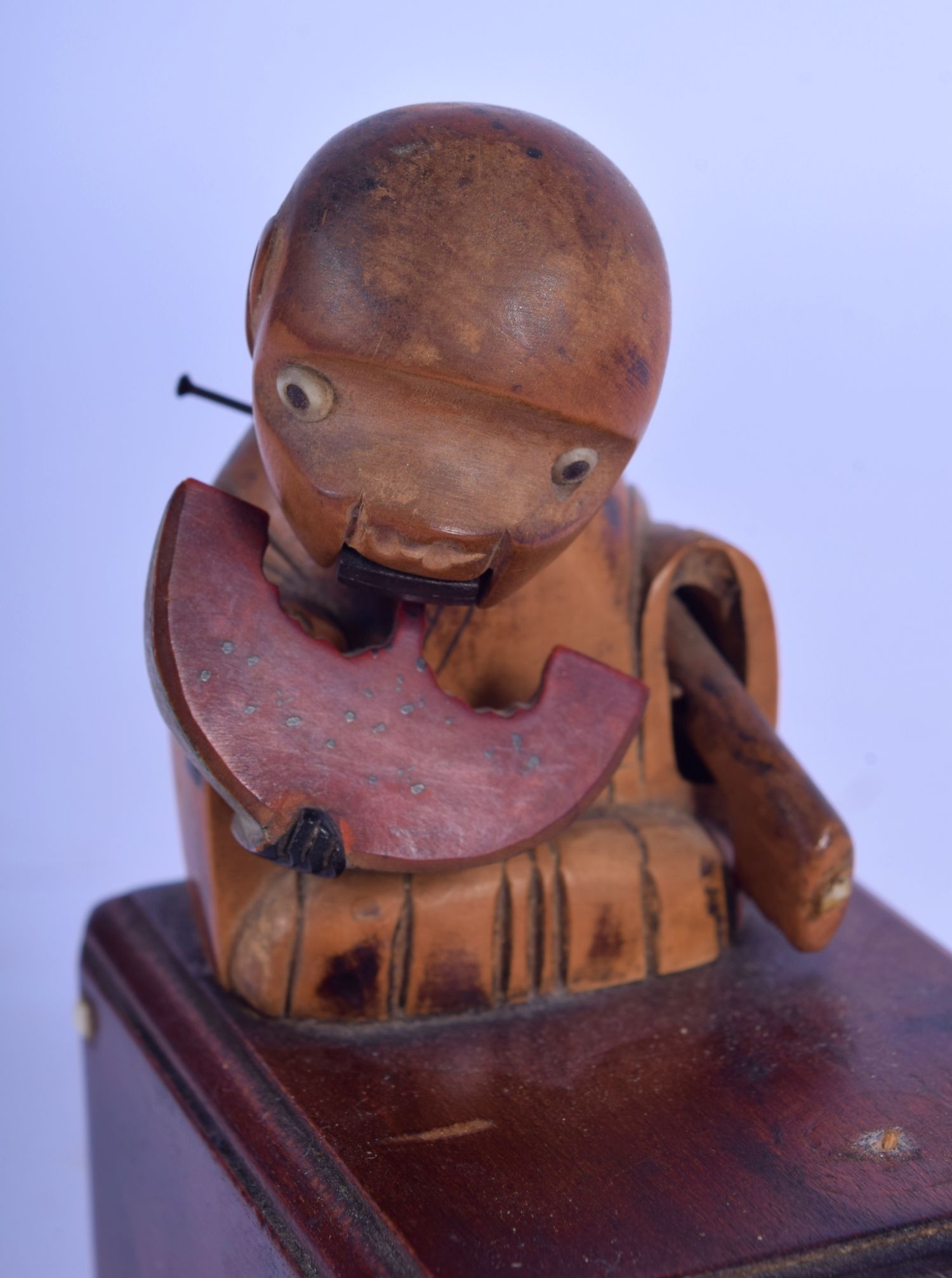 AN UNUSUAL EARLY 20TH CENTURY JAPANESE CARVED KOBE TOY modelled as a male eating melon. 10 cm x 5.5 - Image 3 of 3