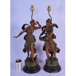 A LARGE PAIR OF 19TH CENTURY FRENCH SPELTER FIGURAL LAMPS After Moreau, modelled as female wearing d