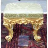 A GEORGE II STYLE COUNTRY HOUSE GILTWOOD STOOL, with extensive gilt and scrolling acanthus. 41 x 44