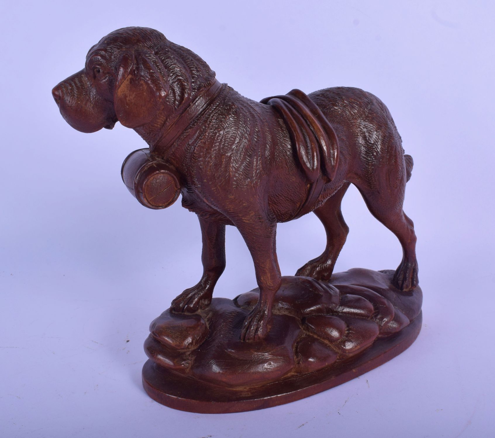 A 19TH CENTURY BAVARIAN BLACK FOREST CARVED WOOD FIGURE OF A HOUND modelled roaming upon a naturalis - Image 2 of 4