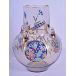 AN AESTHETIC MOVEMENT ENAMELLED GLASS VASE in the manner of Moser. 16 cm x 9 cm.