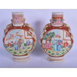 A PAIR OF LATE 18TH CENTURY CHINESE FAMILLE ROSE PORCELAIN PILGRIM FLASKS Qing, painted with figures