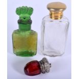 THREE ANTIQUE SCENT BOTTLES. Largest 8.5 cm high. (3)