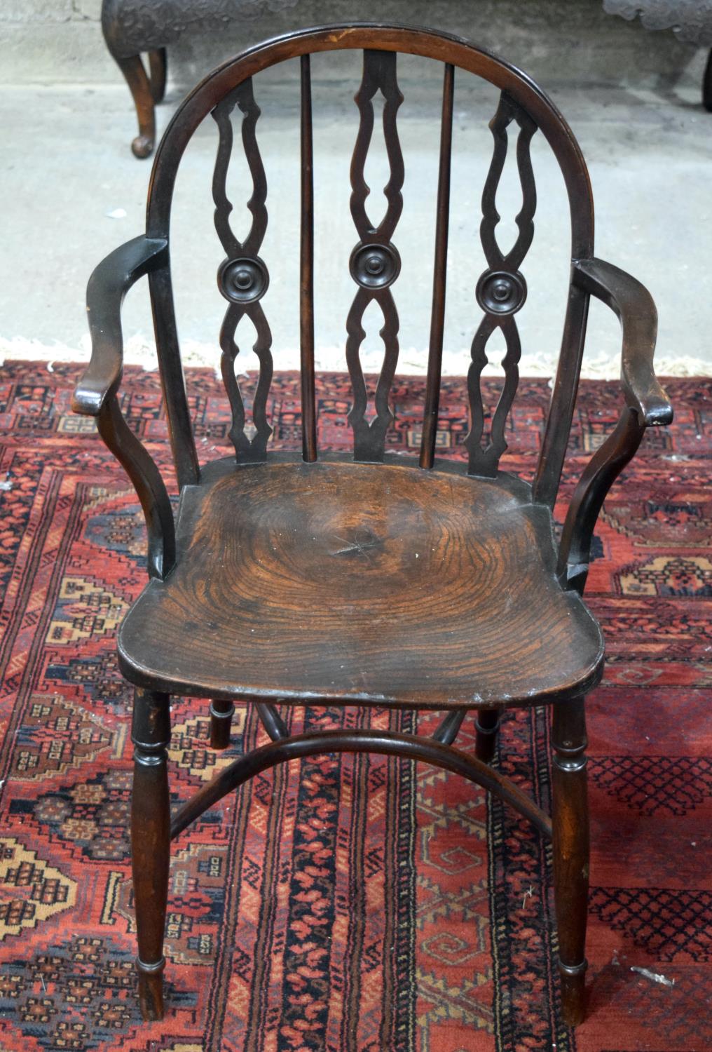 AN 18TH CENTURY DRAUGHT-BACK OAK COUNTRY CHAIR beautifully decorated with three draught counters car