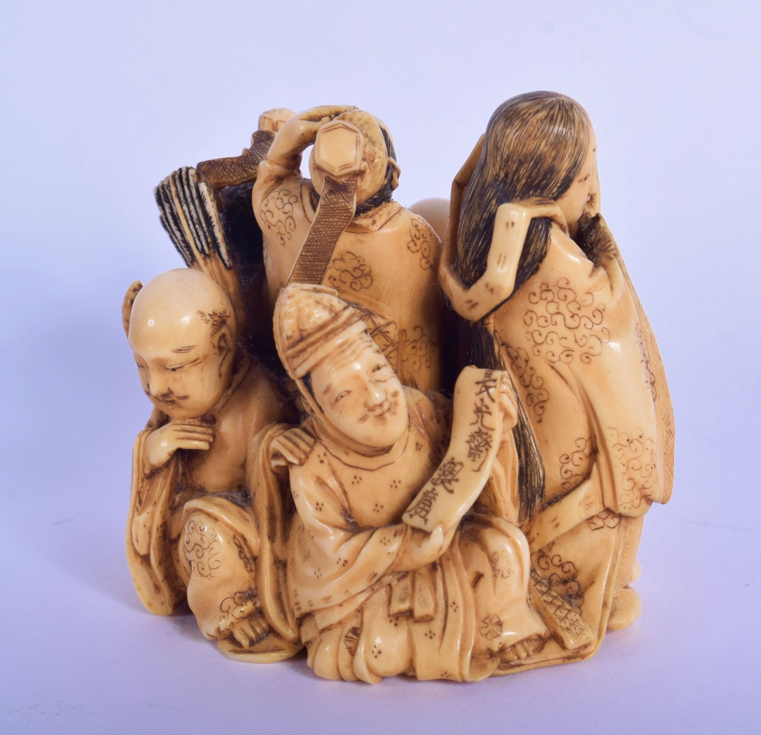 A FINE 19TH CENTURY JAPANESE MEIJI PERIOD CARVED IVORY OKIMONO modelled as various figures, includin - Image 3 of 5