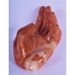 A CHARMING EARLY 20TH CENTURY CARVED AGATE SCULPTURE OF A HAND of highly naturalistic form. 17 cm x