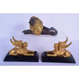 A PAIR OF 19TH CENTURY FRENCH EGYPTIAN REVIVAL GRAND TOUR SPHINX together with a similar bronze lion