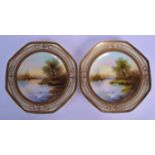 A PAIR OF JAPANESE TAISHO PERIOD NORITAKE PORCELAIN PLATES painted with ducks upon a lake. 20.5 cm w