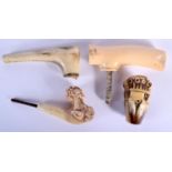 A 19TH CENTURY ANGLO INDIAN CARVED IVORY CANE HANDLE together with three bone handles. Largest 9 cm