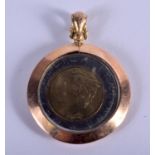 A 9CT GOLD MOUNTED COIN. 11 grams. 4.25 cm x 3.25 cm.