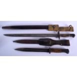 TWO EARLY 20TH CENTURY ENGLISH MILITARY BAYONETS one stamped Vickers, with various numerals across s