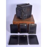 A BOXED GRAFLEX PLATE CAMERA with plates. (qty)