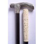 A 19TH CENTURY CHINESE EXPORT SILVER HANDLED WALKING CANE together with a Canton ivory walking cane.