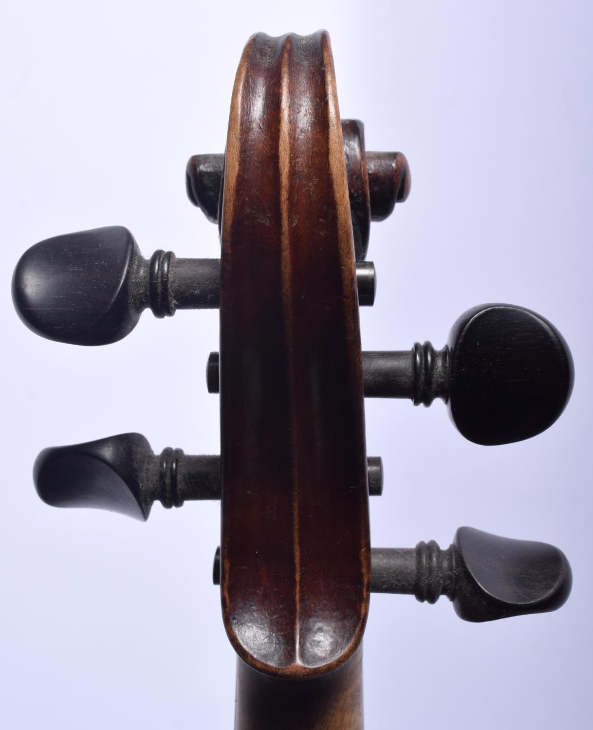 AN ANTIQUE GERMAN TWO PIECE BACK VIOLIN with scrolling terminal. 58 cm long. - Image 9 of 10