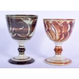 TWO ALDERMASTON POTTERY WINE GOBLETS with chestnut brown decoration on tin glaze, wood-fired, 1963 &