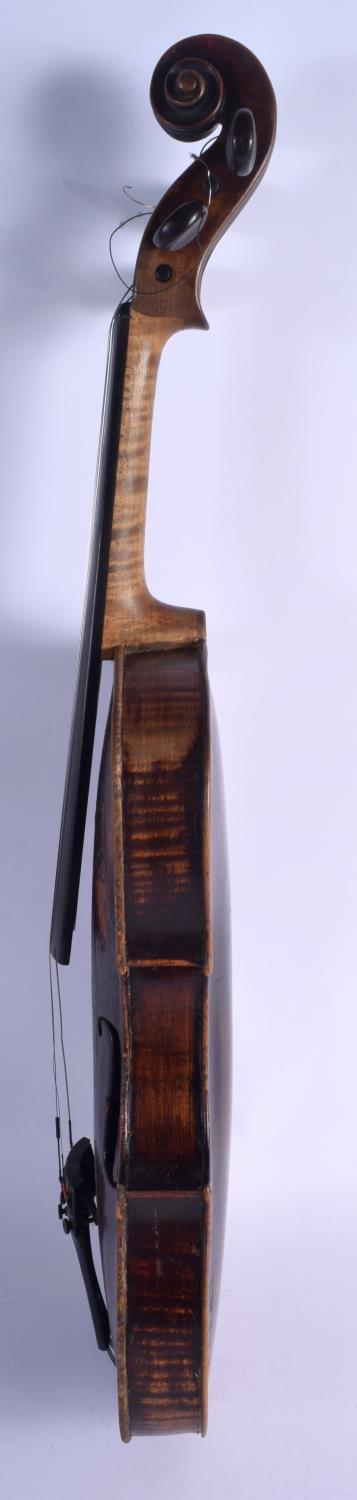 AN ANTIQUE GERMAN TWO PIECE BACK VIOLIN with scrolling terminal. 58 cm long. Provenance: Notes on Th - Image 4 of 16