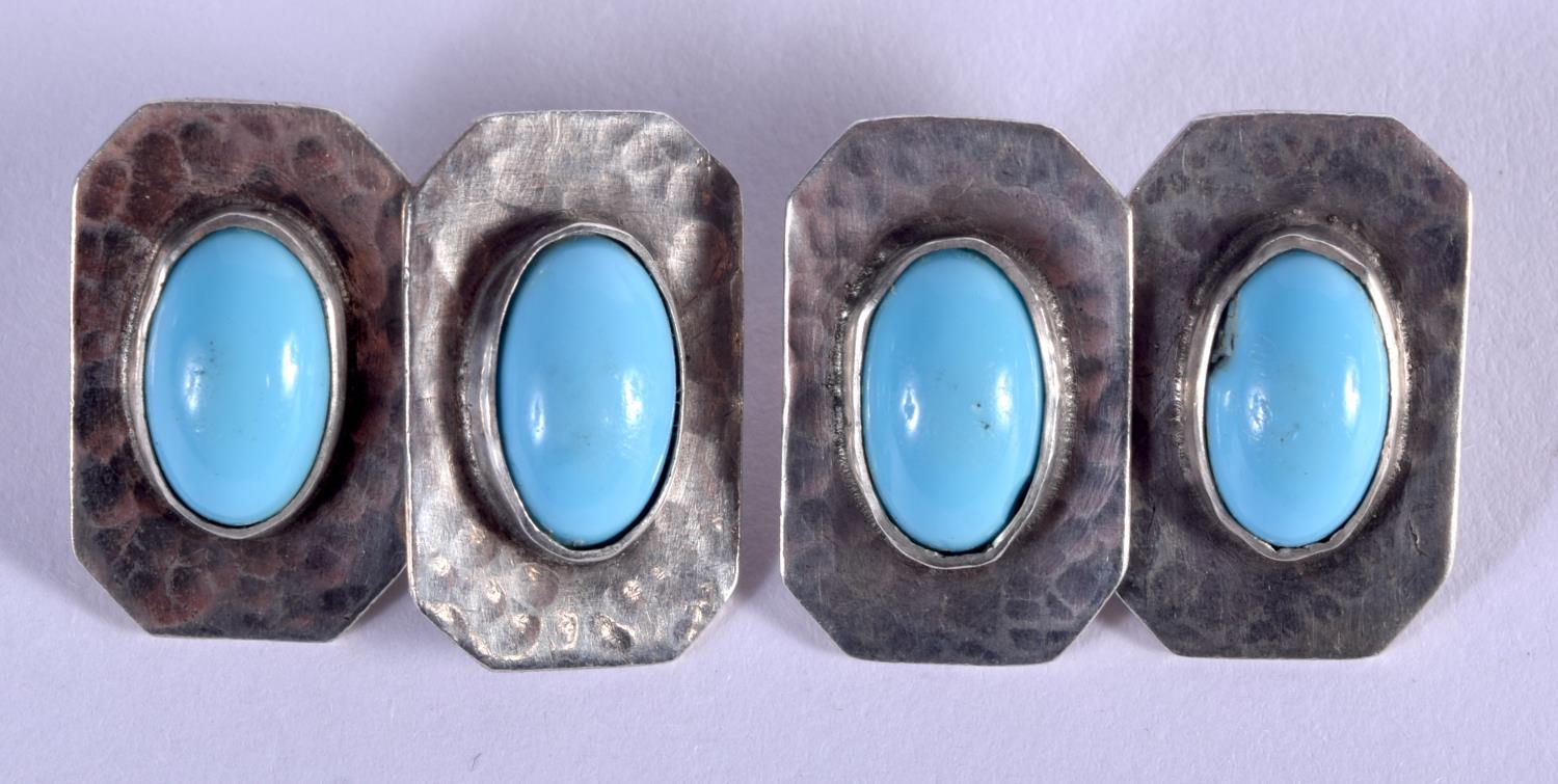 A PAIR OF ART DECO SILVER AND TURQUOISE CUFFLINKS. 8 grams. 2 cm x 1 cm.