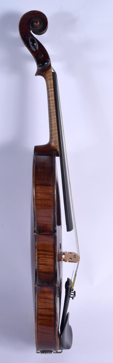 AN ANTIQUE GERMAN TWO PIECE BACK VIOLIN with scrolling terminal. 58 cm long. - Image 4 of 10