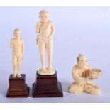 THREE ORIENTAL BONE FIGURES, TWO ON STANDS. Largest 9.7cm x 3.5cm, weight 58.3g