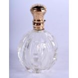 A GOLD TOPPED SCENT BOTTLE. 7.5cm x 4.4cm, weight 66.4g
