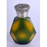 A SILVER TOPPED GLASS SCENT BOTTLE. 7.4cm x .7cm. Weight 81g