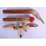 FIVE VINTAGE WALKING CANE HANDLES. Largest 27 cm long. (5)