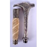 AN ANTIQUE SILVER BIRD HEAD CANE HANDLE together with another handle. 14 cm long. (2)
