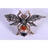 A CHARMING ANTIQUE RUBY AND ENAMEL BUG BROOCH. 4.2 grams. 2 cm x 2 cm.