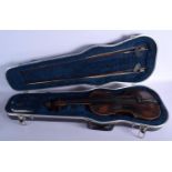 AN ANTIQUE GERMAN TWO PIECE BACK VIOLIN with scrolling terminal. 58 cm long. Provenance: Notes on Th