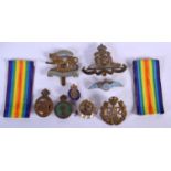 A QUANTITY OF MILITARY BADGES (8)