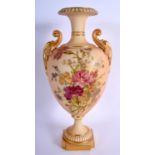 Royal Worcester large two handled vase painted and gilded with flowers on a blush ivory ground, shap