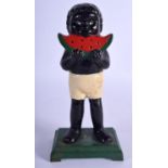 A CHARMING VINTAGE CAST IRON MONEY BANK modelled as a young boy munching on a water melon. 25 cm hig